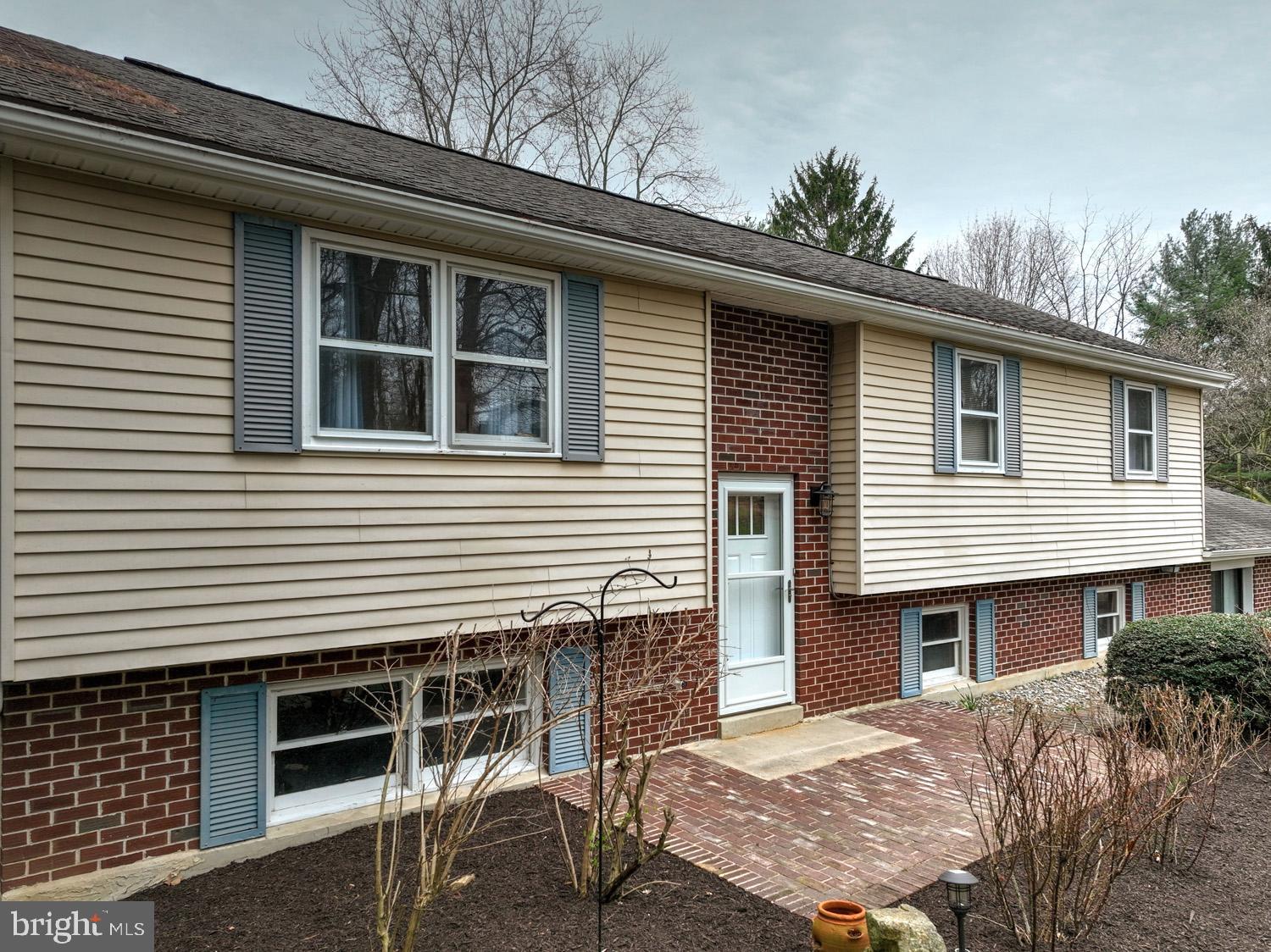1822 Little Conestoga Road Elverson, PA 19520 - Photo 4 of 30 a backyard of a house with seating space