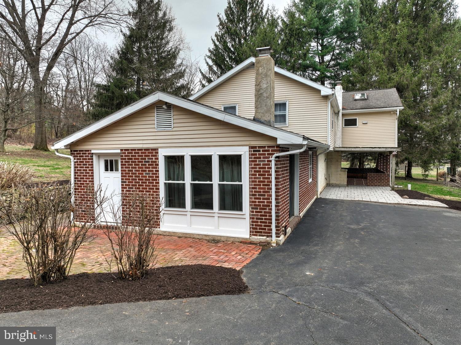 1822 Little Conestoga Road Elverson, PA 19520 - Photo 10 of 30 a front view of a house with a yard and garage