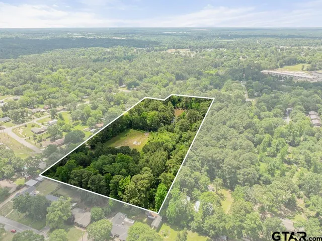a view of a lake with a house