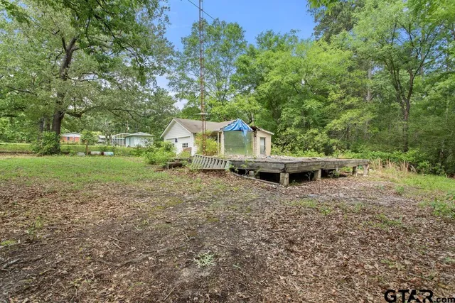 a garden view with a seating space