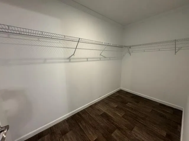 a view of a room with racks on the wall