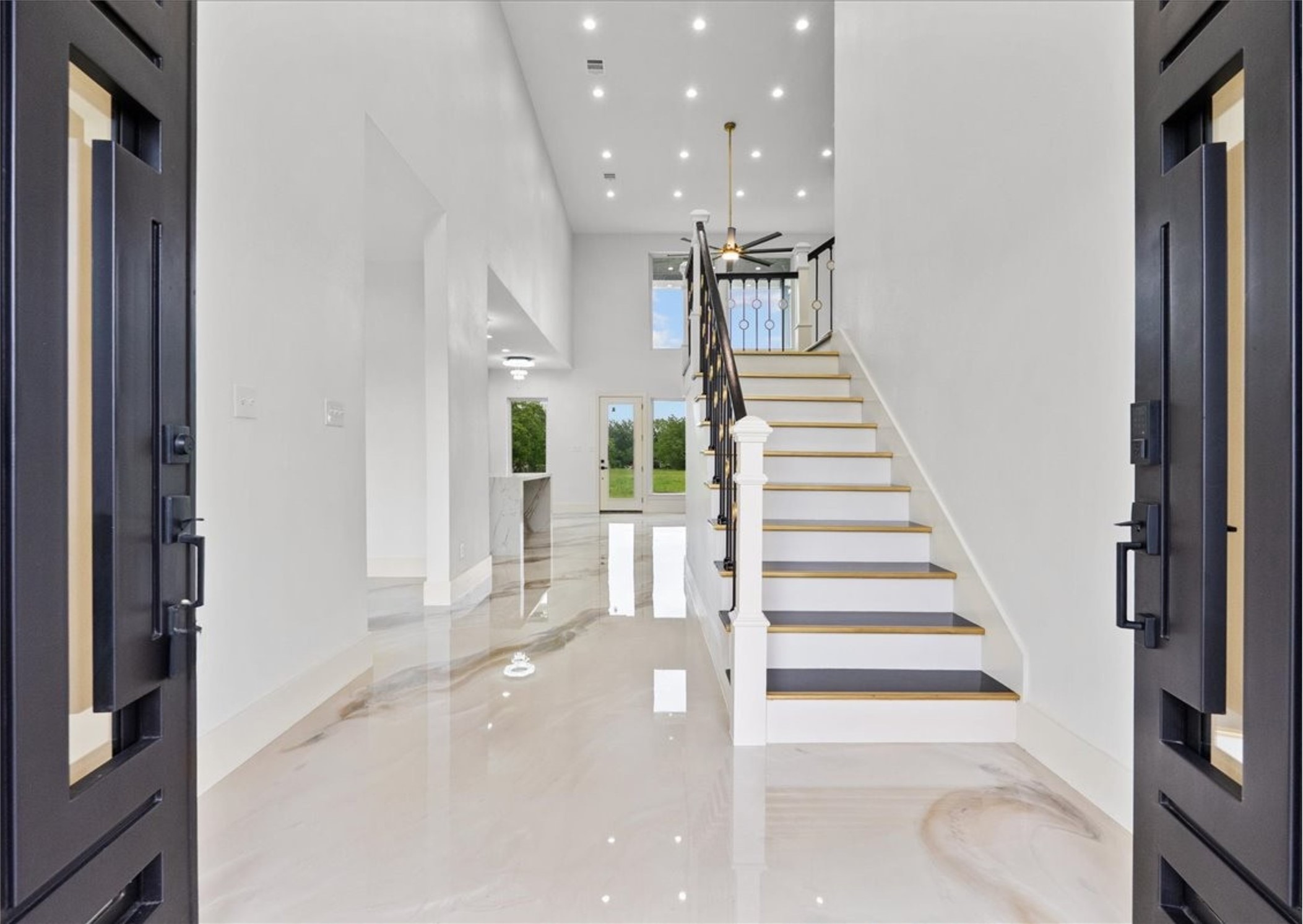 3237 Harkey Road Pearland, TX 77584 - Photo 4 of 46 Grand two-story entry with dramatic ceilings and designer staircase.