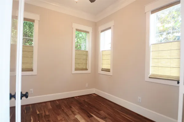 a kitchen with stainless steel appliances kitchen island granite countertop a sink and cabinets