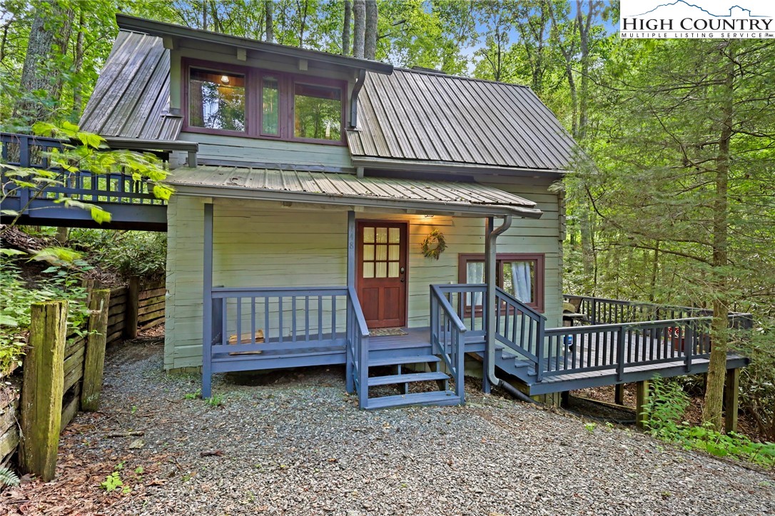 a view of a deck with a yard