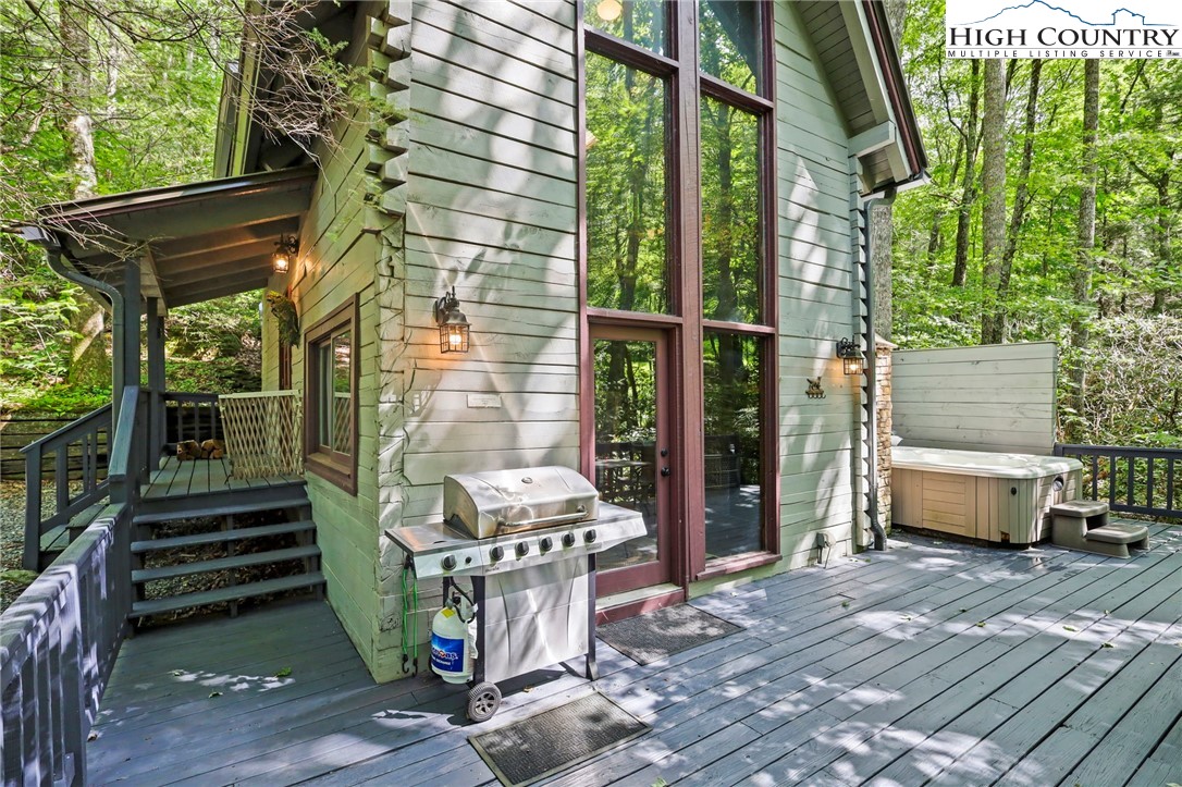 148 Estates Drive Boone, NC 28607 - Photo 12 of 16 a view of outdoor space deck and tree