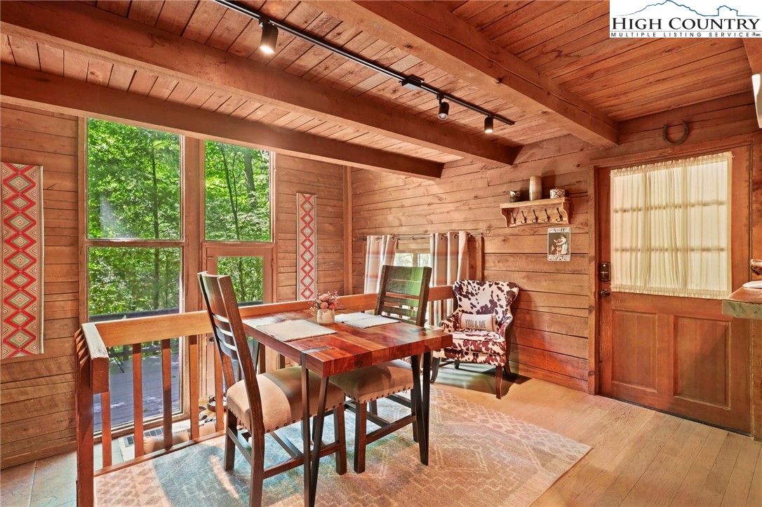 148 Estates Drive Boone, NC 28607 - Photo 5 of 16 a view of a dining room with furniture window and outside view