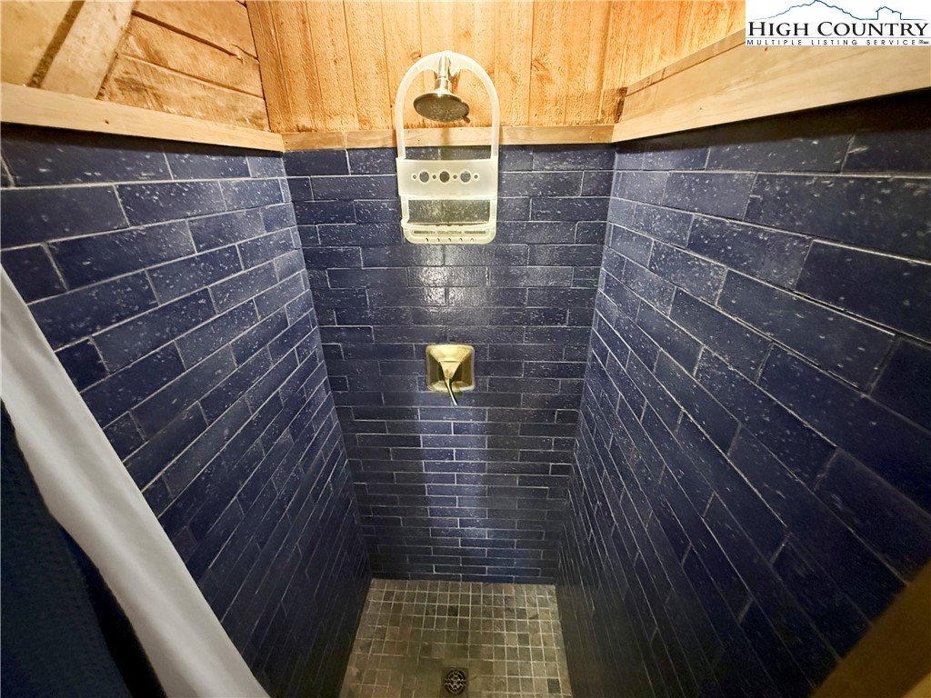 148 Estates Drive Boone, NC 28607 - Photo 10 of 16 a bathroom with a shower