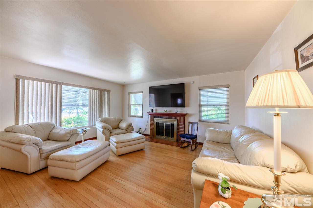 705 East Taylor Street Reno, NV 89502 - Photo 3 of 20 a living room with furniture and a flat screen tv