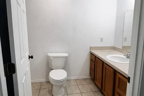 a bathroom with a sink and a toilet