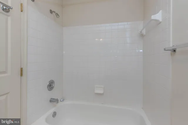 a room that has a bed and a window