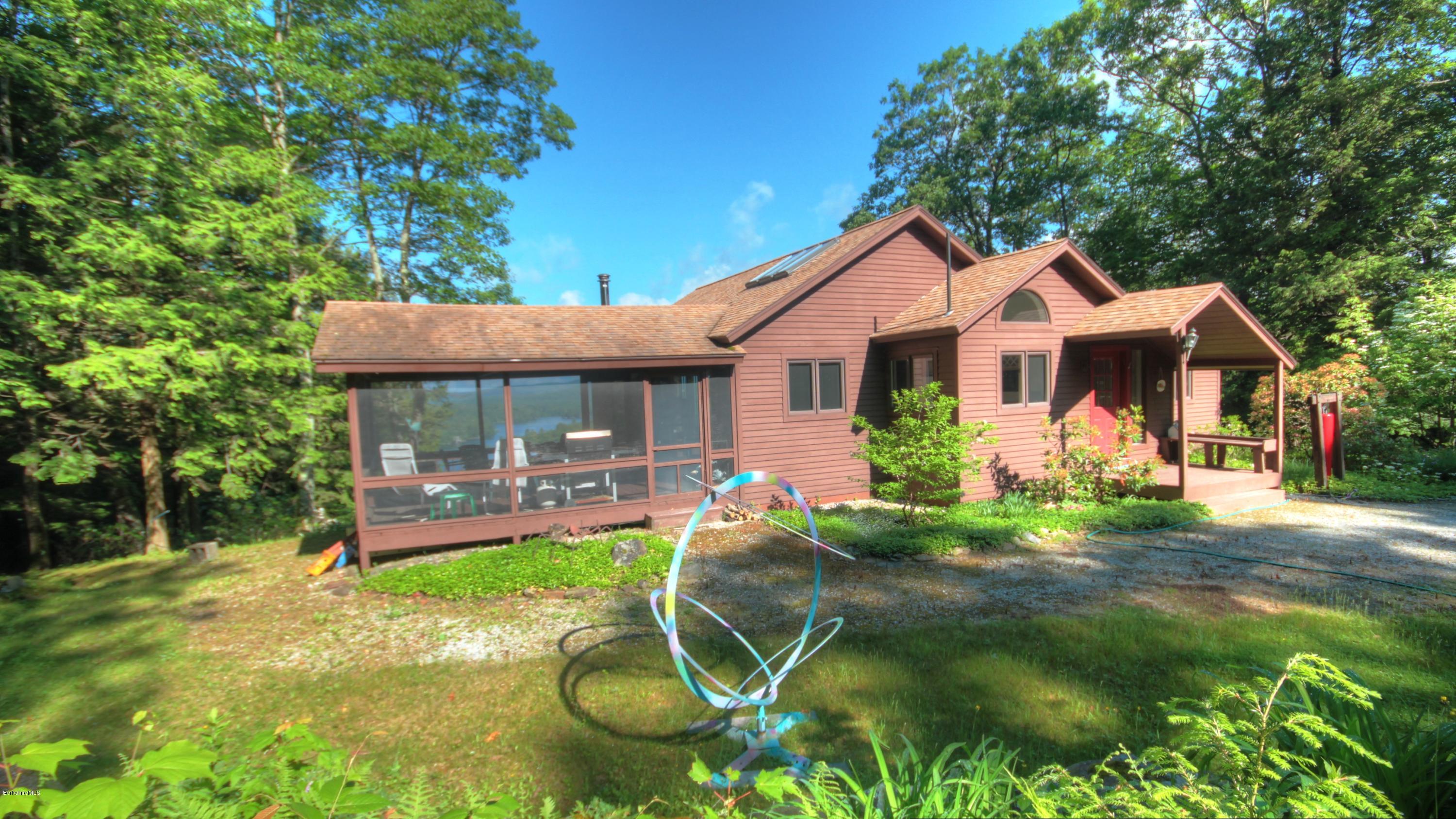 75 Laurel Hill Road Monterey, MA 01245 - Photo 1 of 25 front view of a house with a yard