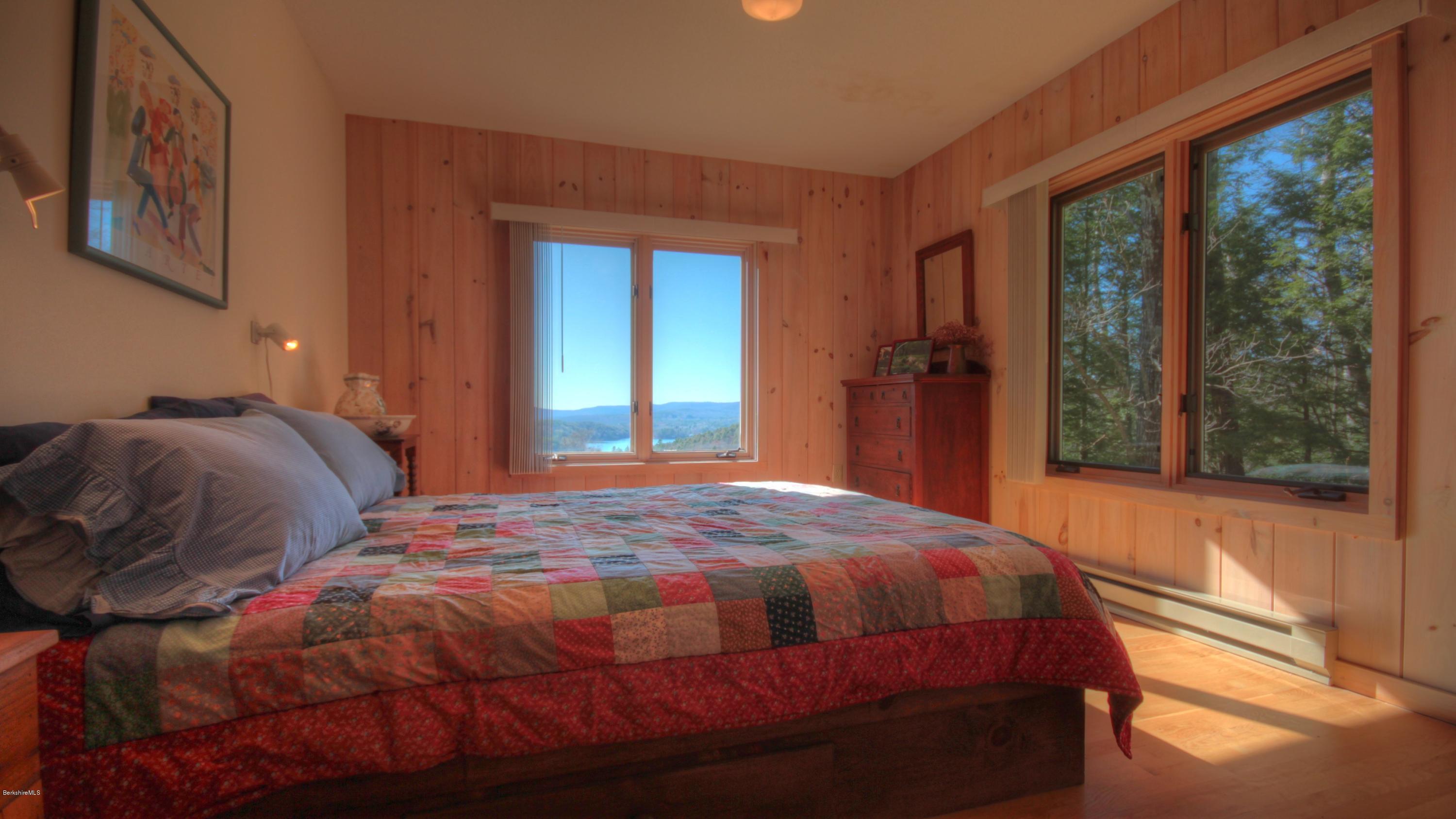 75 Laurel Hill Road Monterey, MA 01245 - Photo 19 of 25 a bedroom with a bed and window