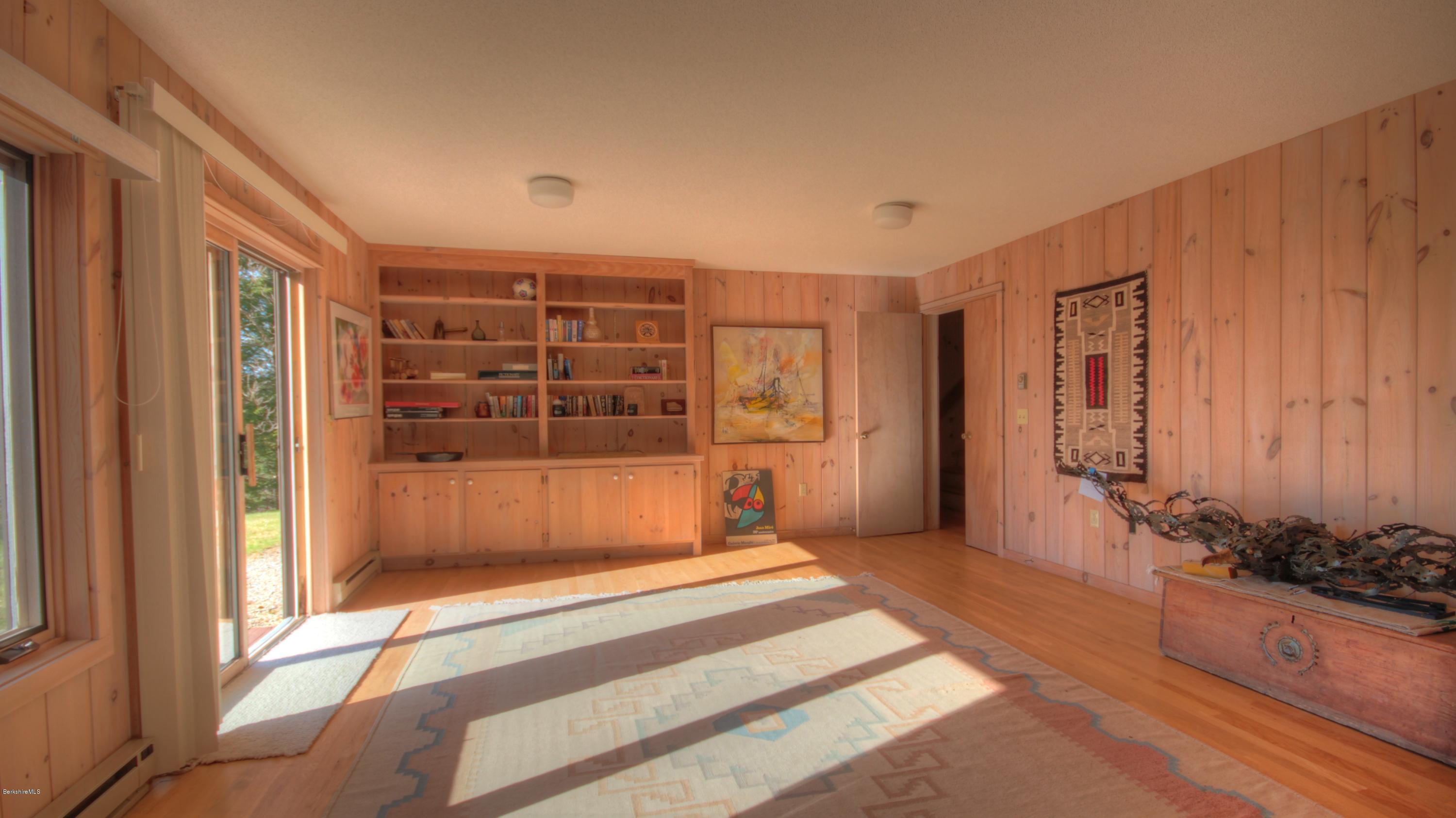 75 Laurel Hill Road Monterey, MA 01245 - Photo 24 of 25 a spacious bedroom with a bed and a window