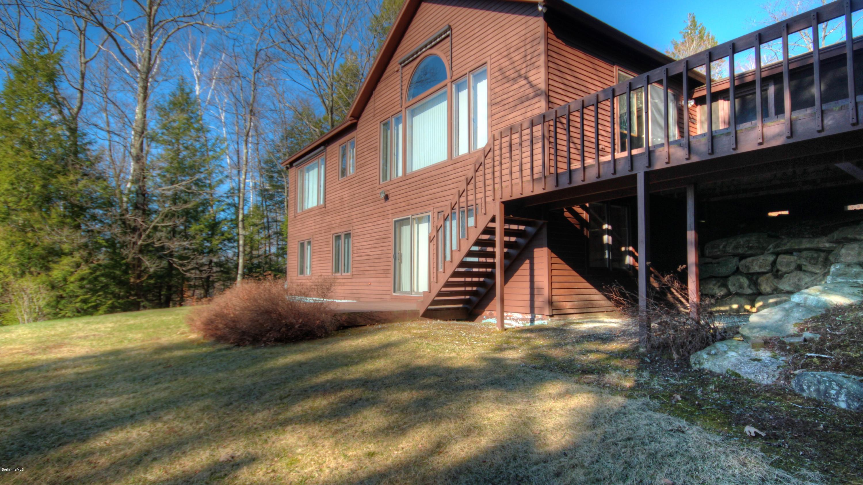 75 Laurel Hill Road Monterey, MA 01245 - Photo 25 of 25 a view of a house with a yard
