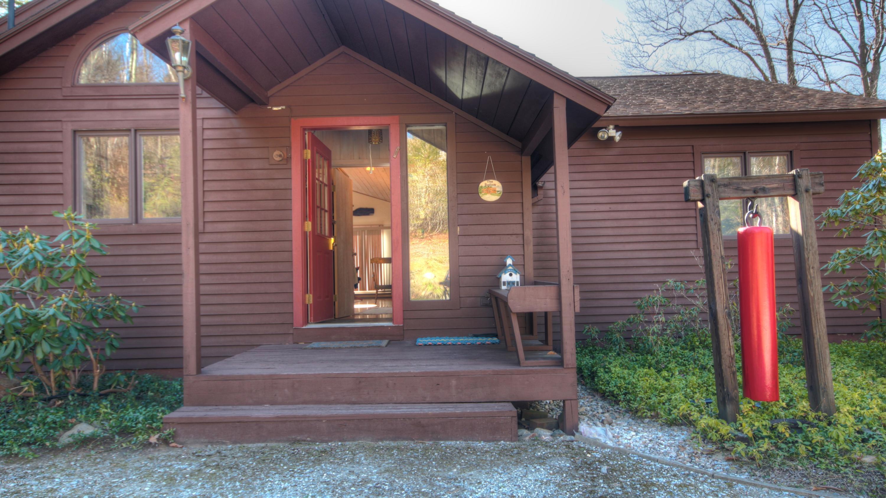 75 Laurel Hill Road Monterey, MA 01245 - Photo 5 of 25 a front view of a house with a yard