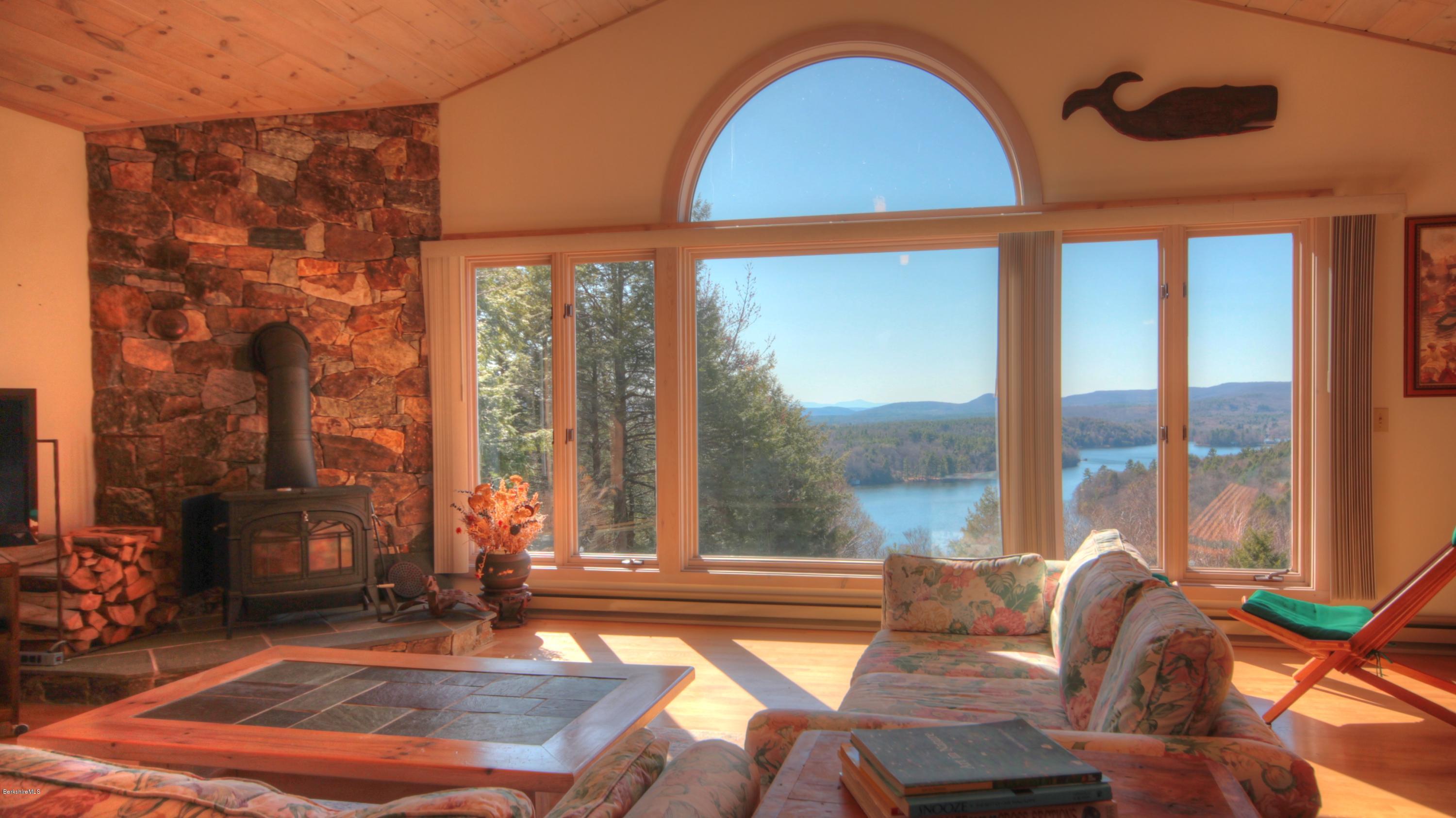 75 Laurel Hill Road Monterey, MA 01245 - Photo 7 of 25 a living room with large windows
