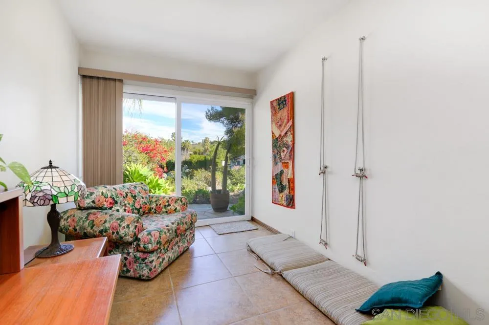 4470 Monahan Road La Mesa, CA 91941 - Photo 10 of 26 a living room with furniture and a potted plant