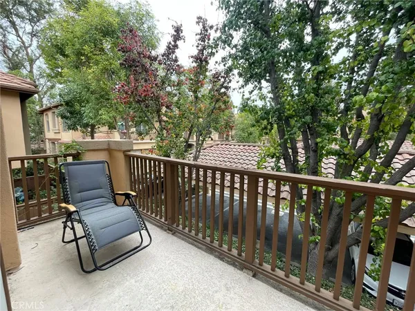 a view of a two chairs in the roof deck