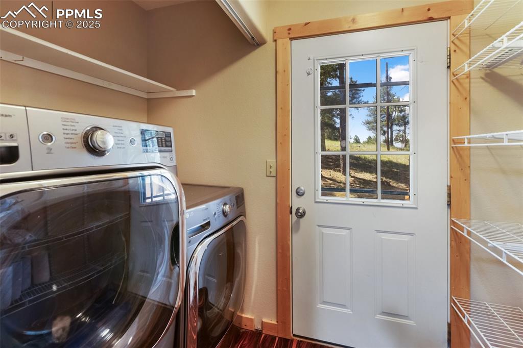 234 Wahsatch Road Florissant, CO 80816 - Photo 25 of 44 a utility room with dryer and washer