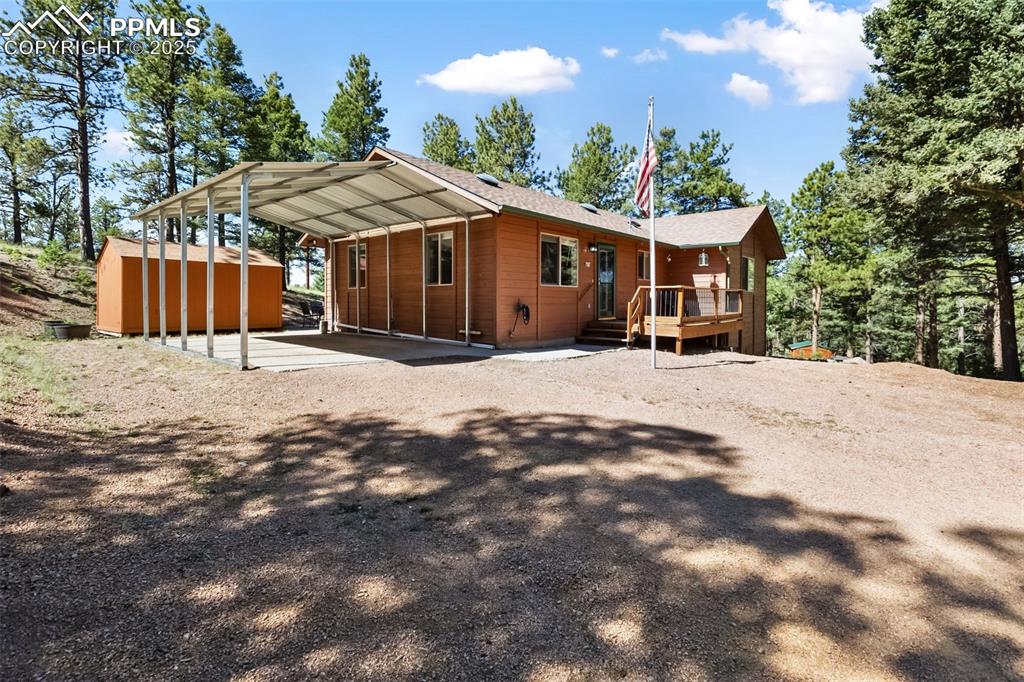 234 Wahsatch Road Florissant, CO 80816 - Photo 30 of 44 a view of a house with a yard covered in snow