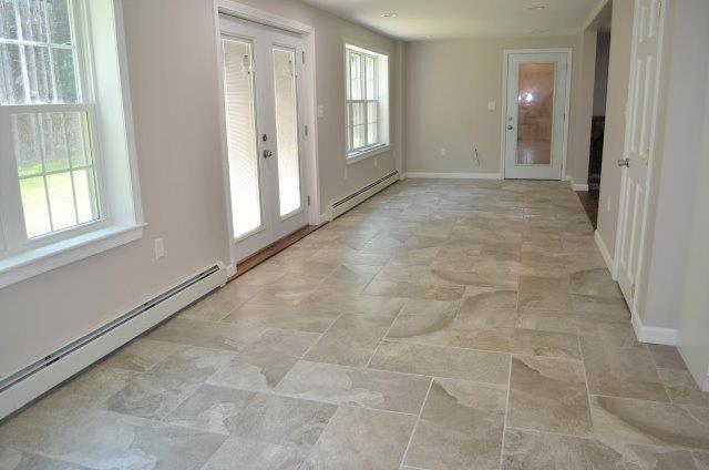 310 Songo School Road Naples, ME 04055 - Photo 8 of 29 sunroom-living room-310 songo