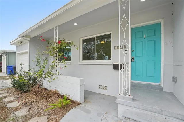 a view of balcony with a potted plant