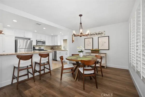 a view of a dining room with furniture