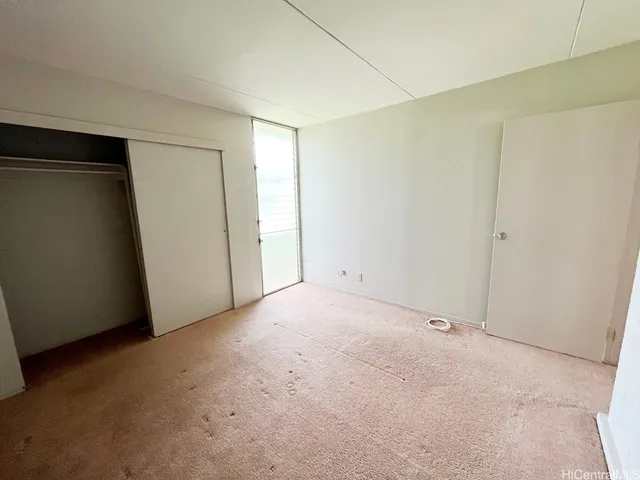 an empty room with closet