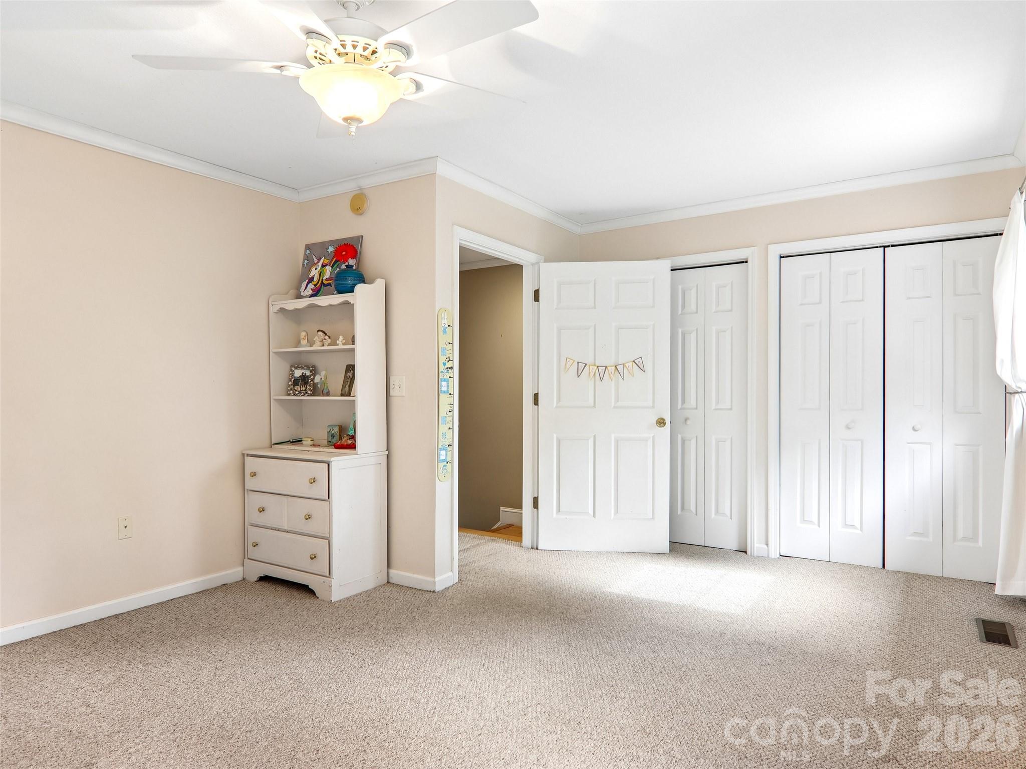 34 Union Chapel Road, Unit 7 Weaverville, NC 28787 - Photo 27 of 37 an empty room with windows and closet