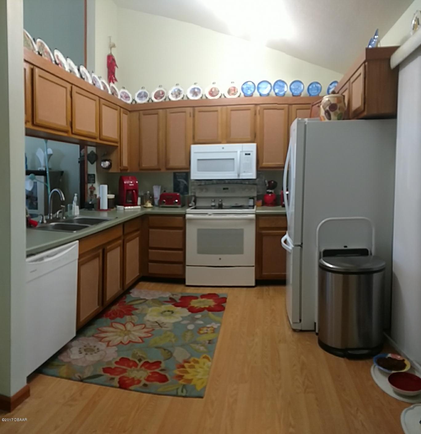 3542 Creekside Road, Unit F Port Orange, FL 32129 - Photo 4 of 15 Creekside Kitchen 2