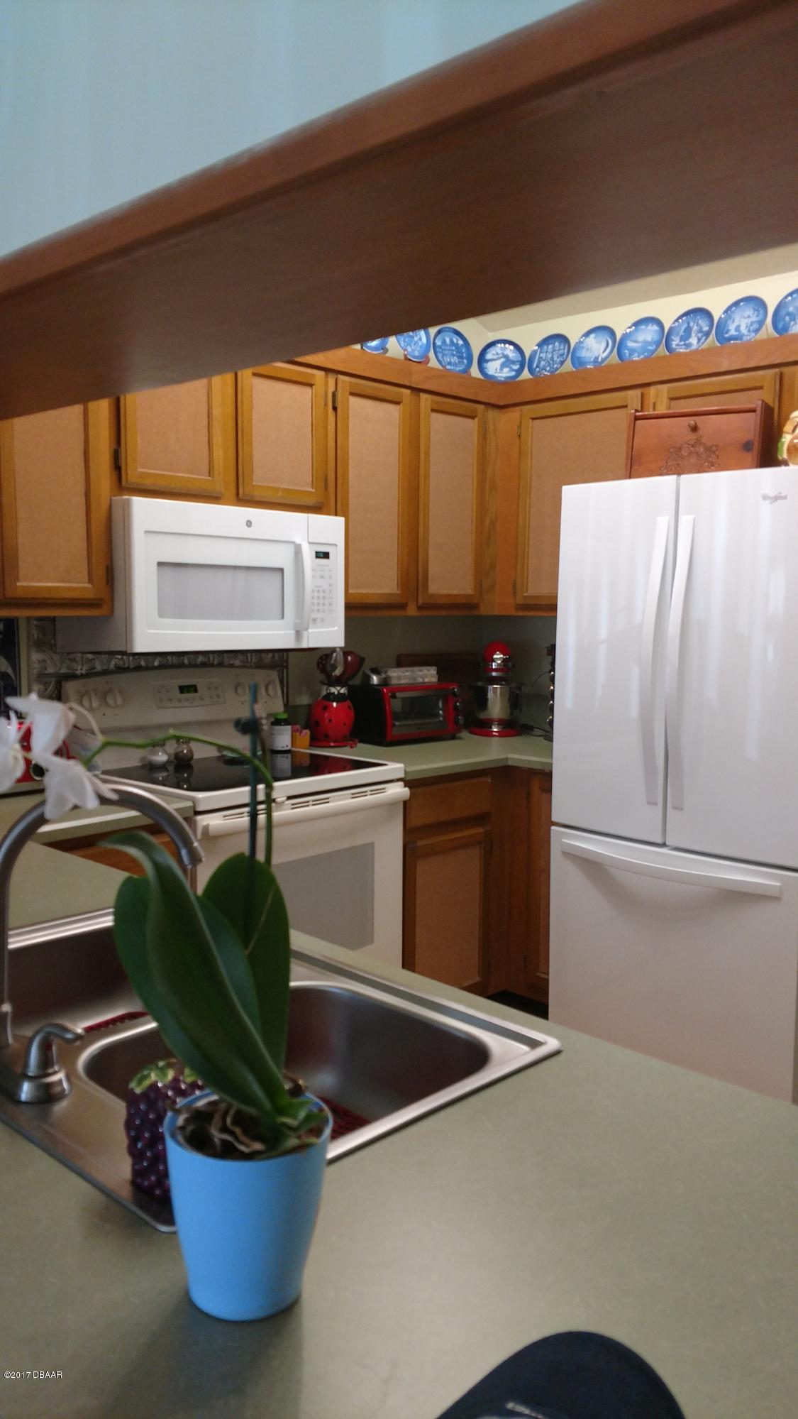 3542 Creekside Road, Unit F Port Orange, FL 32129 - Photo 5 of 15 Creekside Kitchen 1