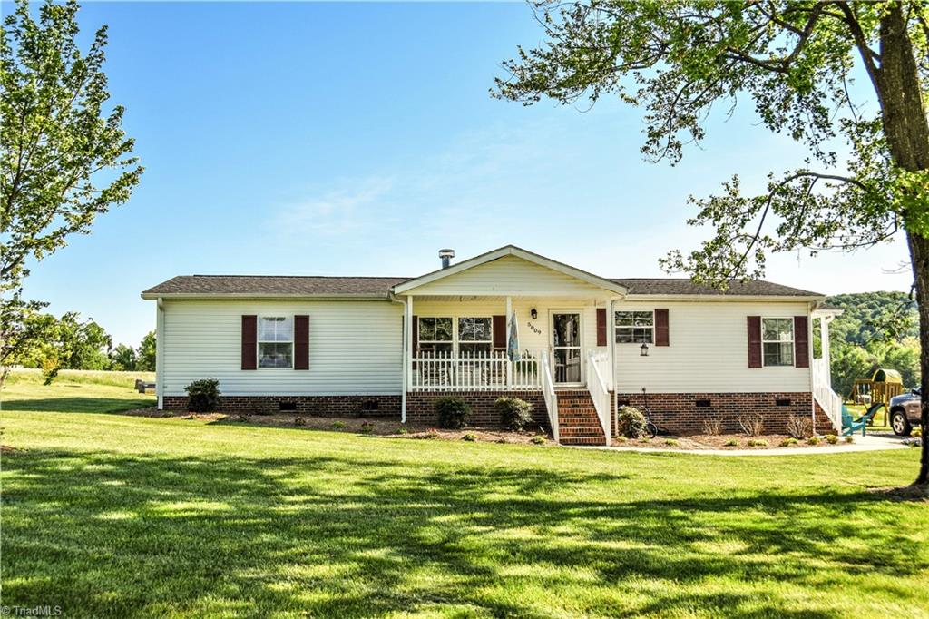 5809 Clingman Road Hamptonville, NC 27020 - Photo 1 of 22 Beautiful Home, Beautiful Yard, Beautiful Views!