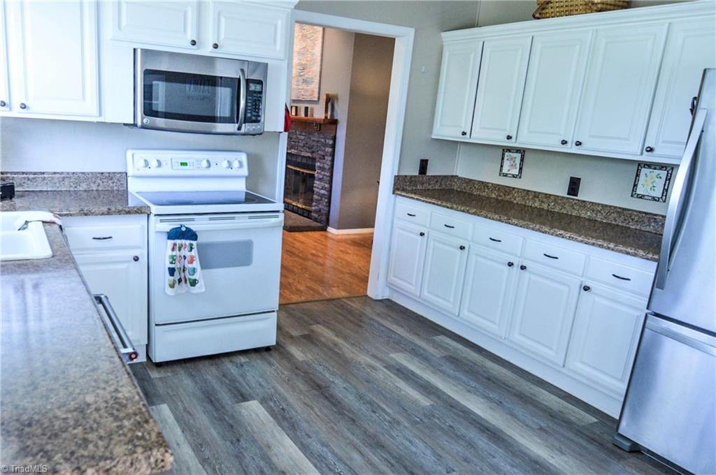 5809 Clingman Road Hamptonville, NC 27020 - Photo 12 of 22 More Cabinets on the left side of kitchen for excellent storage!