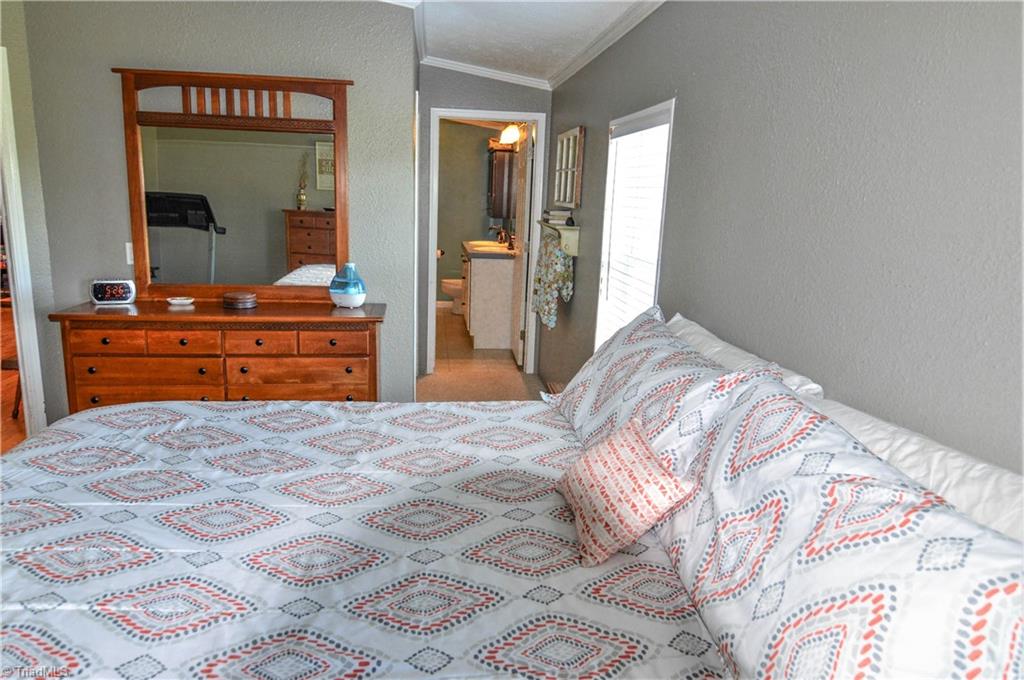5809 Clingman Road Hamptonville, NC 27020 - Photo 14 of 22 Large Primary Bedroom with adjoining bath!