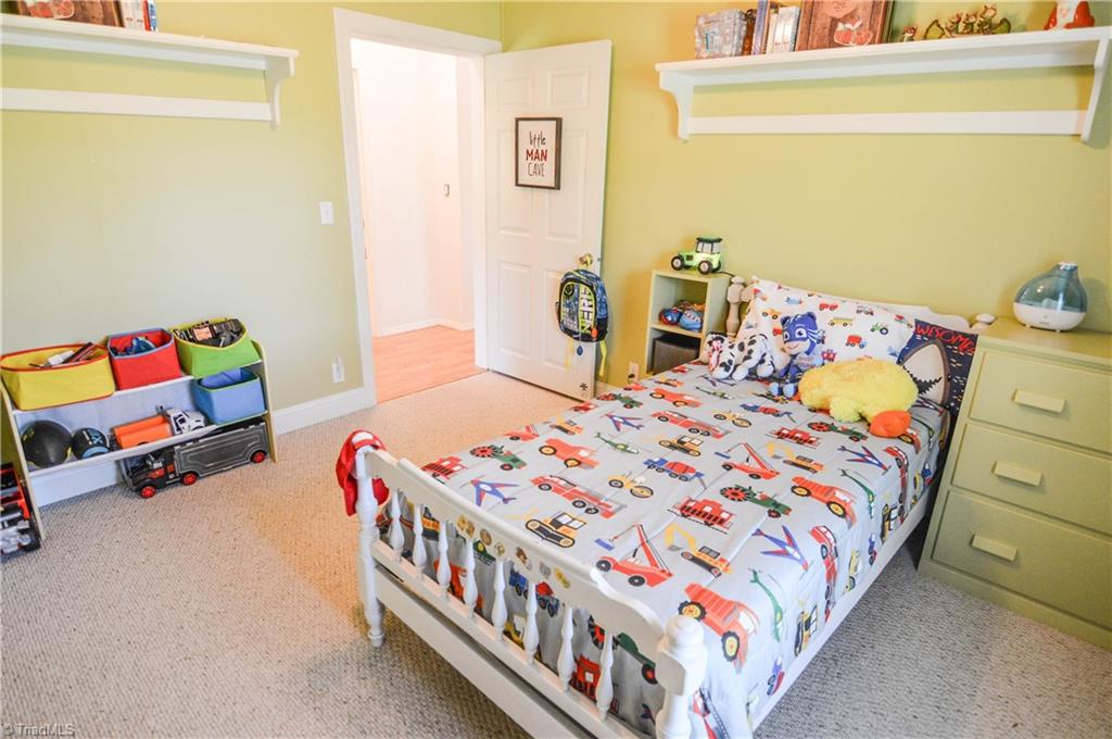 5809 Clingman Road Hamptonville, NC 27020 - Photo 19 of 22 Another view of bedroom with nice shelving in place!