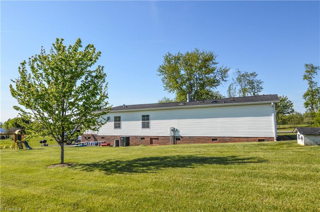 5809 Clingman Road Hamptonville, NC 27020 - Photo 22 of 22 A view of the large backyard!
