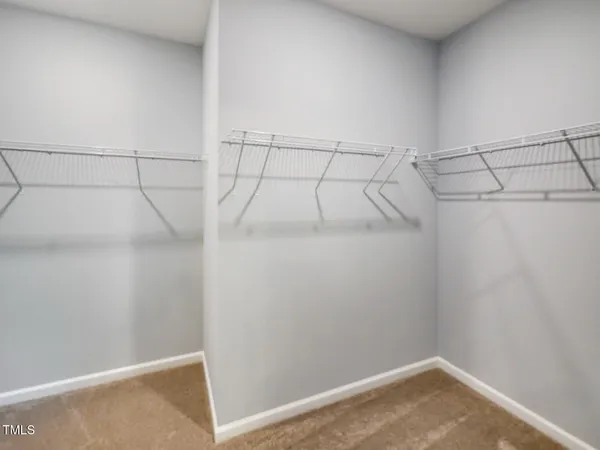 a view of a room with racks on the wall