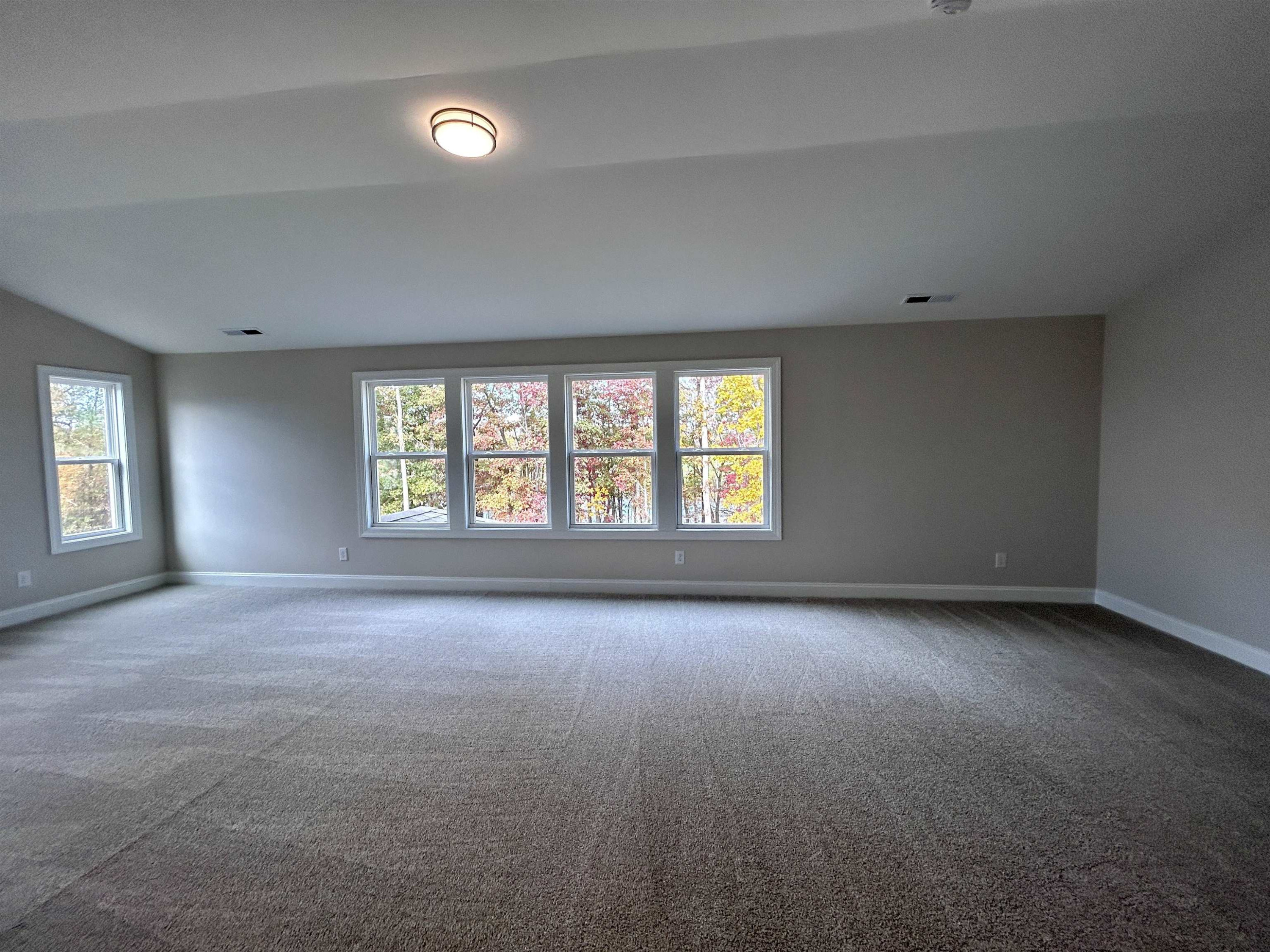 208 Kavanaugh Road Wake Forest, NC 27587 - Photo 15 of 23 an empty room with a window and pillar in it