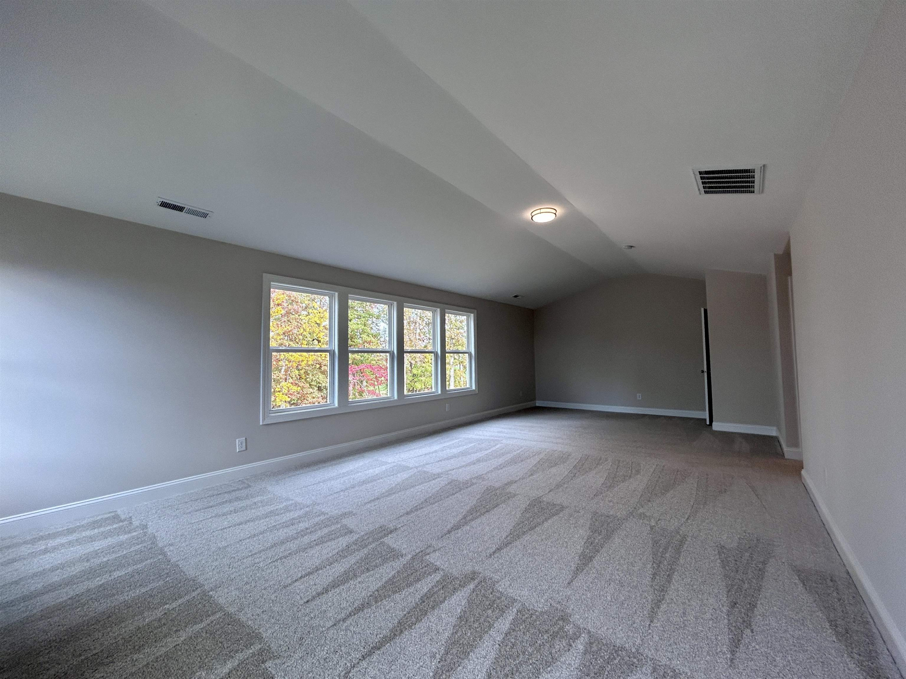 208 Kavanaugh Road Wake Forest, NC 27587 - Photo 16 of 23 a view of an empty room with a window
