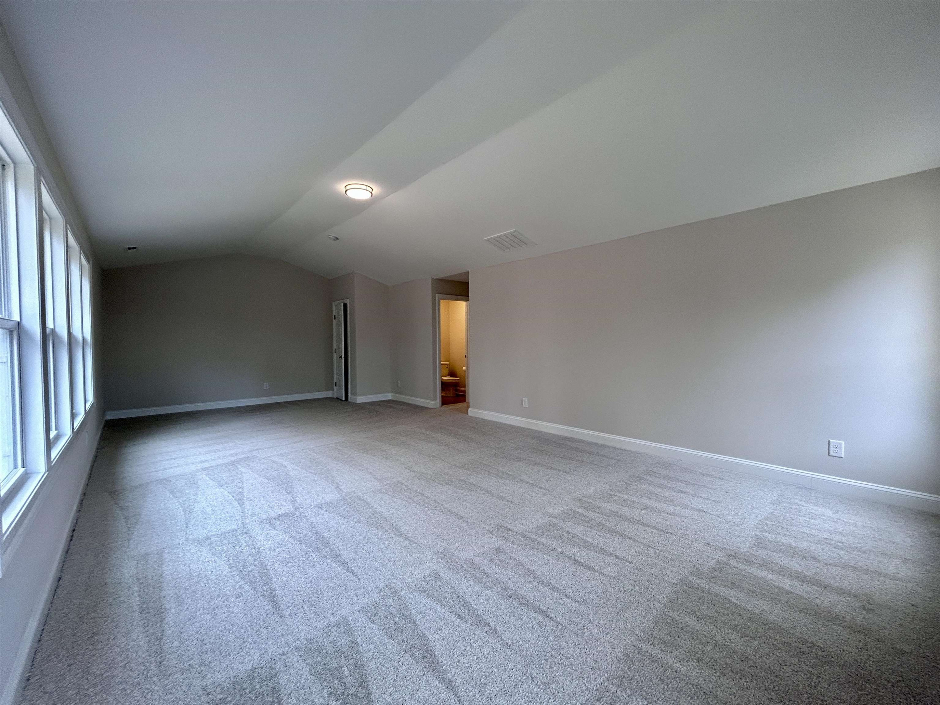 208 Kavanaugh Road Wake Forest, NC 27587 - Photo 17 of 23 a view of empty room with wooden floor