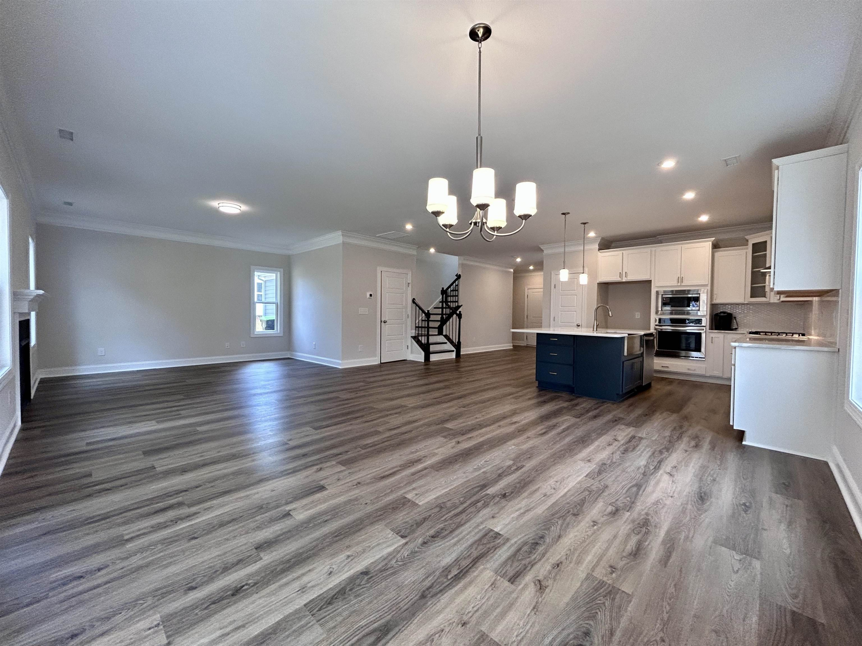 208 Kavanaugh Road Wake Forest, NC 27587 - Photo 6 of 23 a view of a kitchen with microwave and cabinets