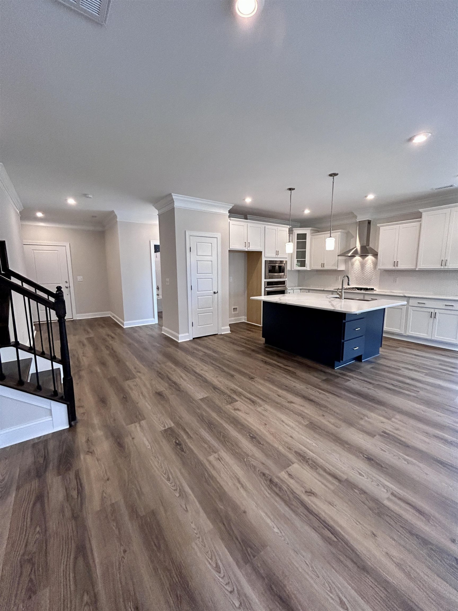 208 Kavanaugh Road Wake Forest, NC 27587 - Photo 9 of 23 a view of kitchen and kitchen island