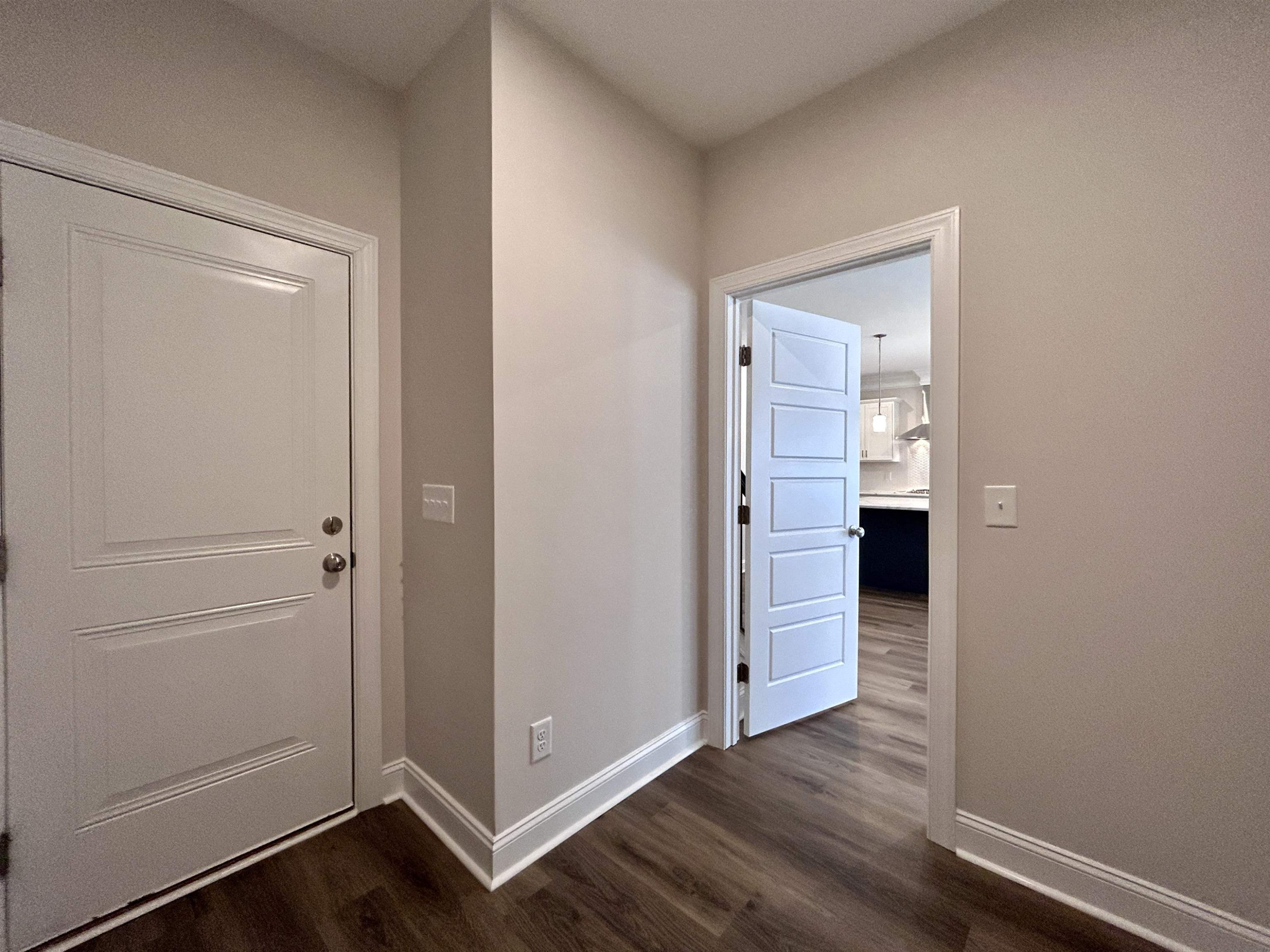 208 Kavanaugh Road Wake Forest, NC 27587 - Photo 10 of 23 an empty room with wooden floor