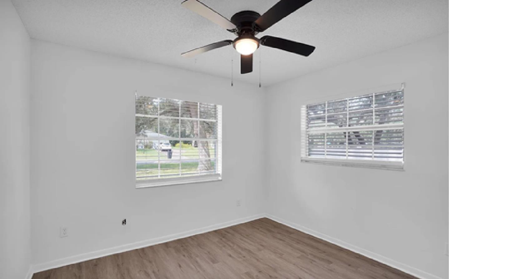 1010 San Remo Road St. Augustine, FL 32086 - Photo 13 of 47 a room with window and ceiling fan