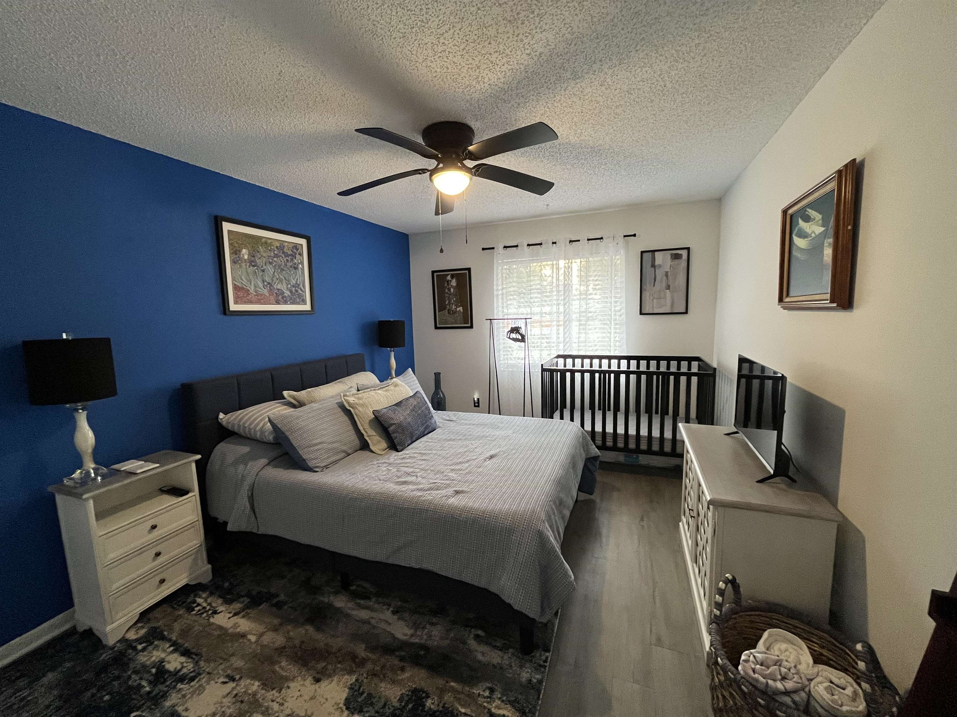 1010 San Remo Road St. Augustine, FL 32086 - Photo 37 of 47 a bedroom with a bed and a tv