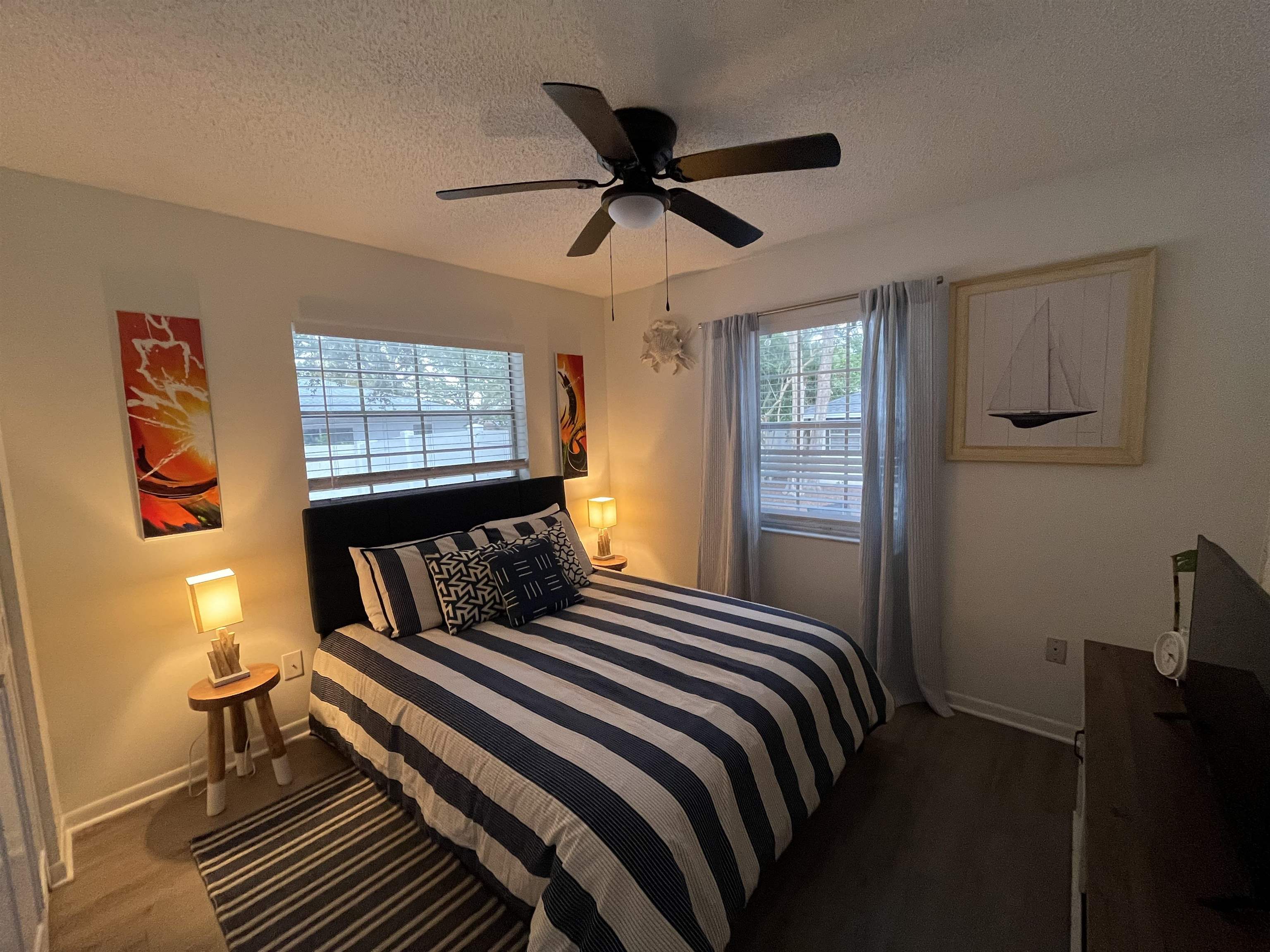 1010 San Remo Road St. Augustine, FL 32086 - Photo 40 of 47 a bedroom with a bed and wooden floor