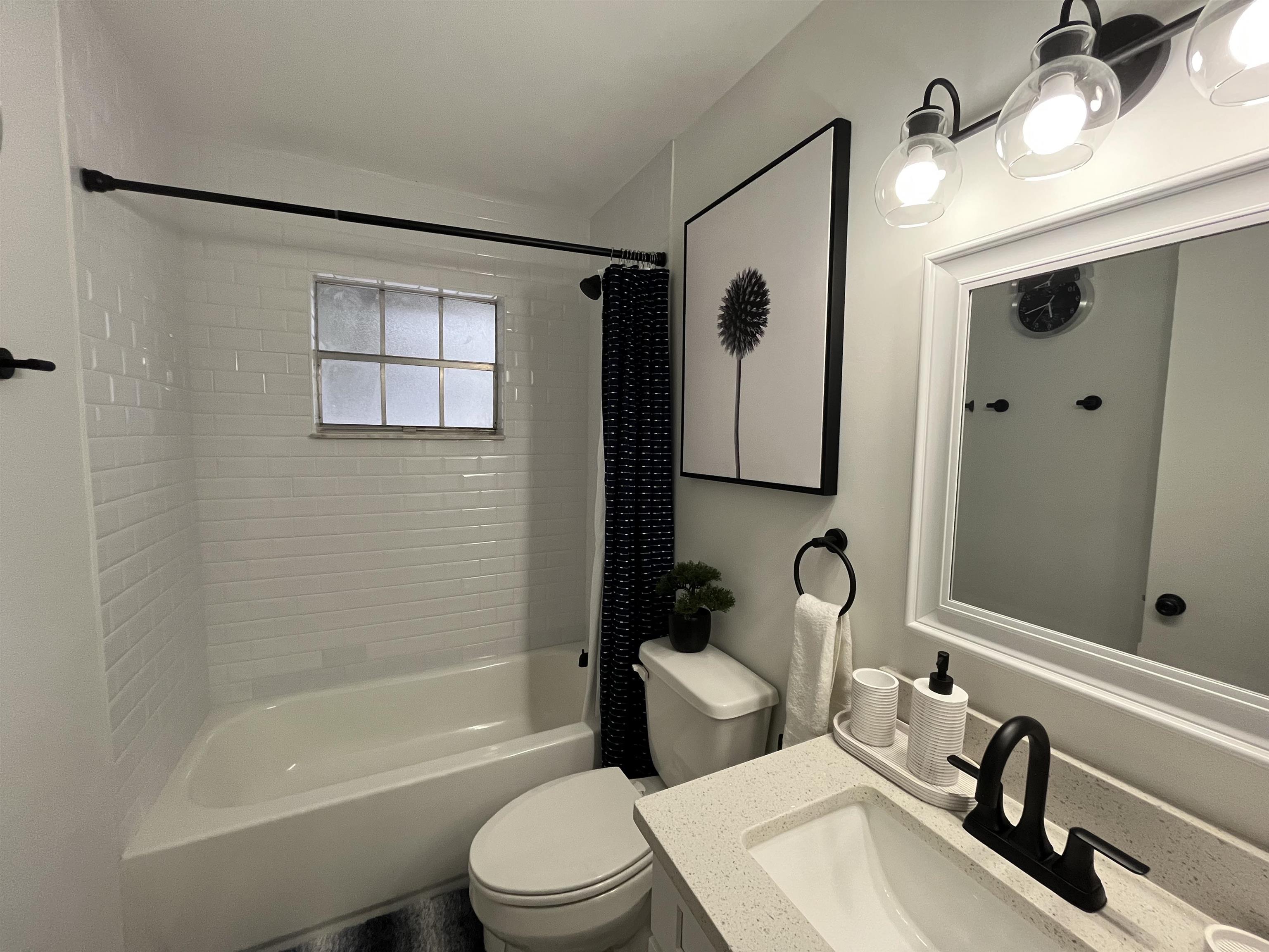 1010 San Remo Road St. Augustine, FL 32086 - Photo 42 of 47 a bathroom with a sink toilet and shower