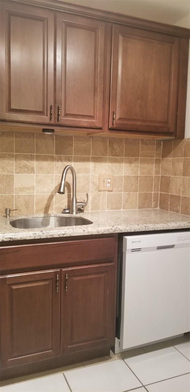255 South Cypress Road, Unit 301 Pompano Beach, FL 33060 - Photo 2 of 42 a sink with granite countertop cabinets