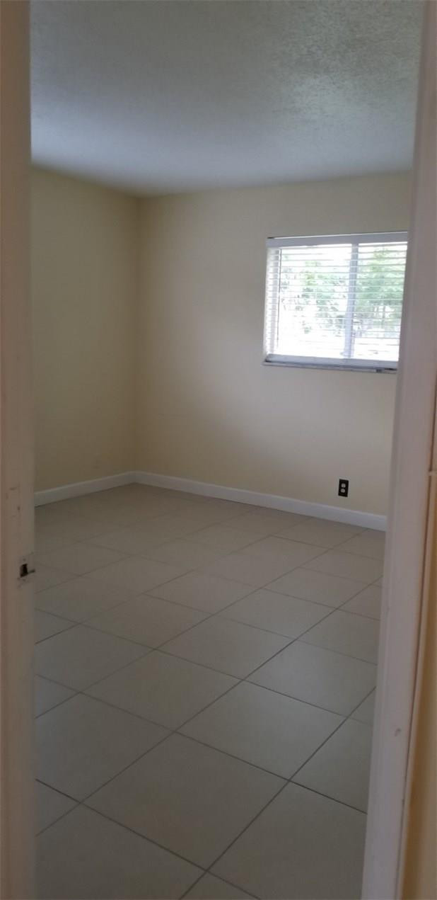 255 South Cypress Road, Unit 301 Pompano Beach, FL 33060 - Photo 26 of 42 a view of room and window