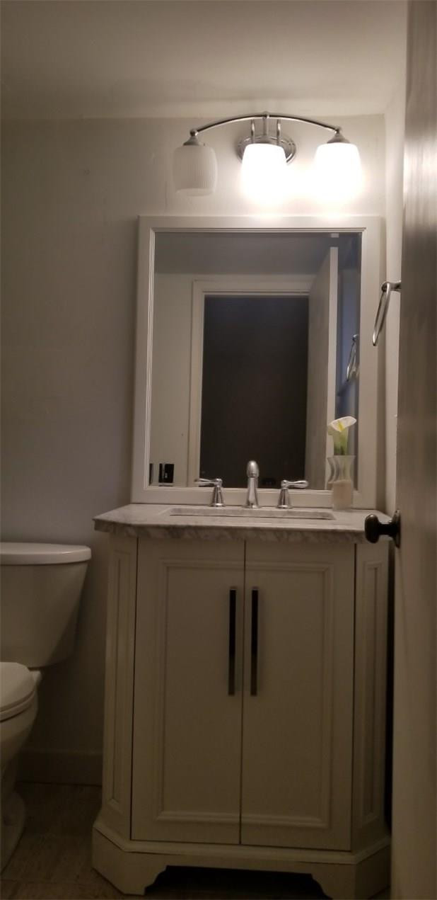 255 South Cypress Road, Unit 301 Pompano Beach, FL 33060 - Photo 28 of 42 a bathroom with a sink and a mirror